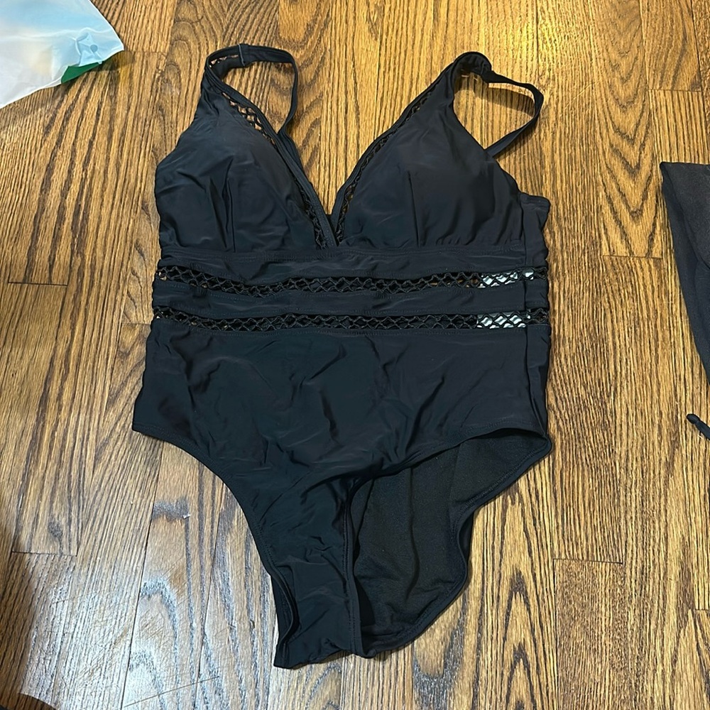 Black curvy one piece bathing suit